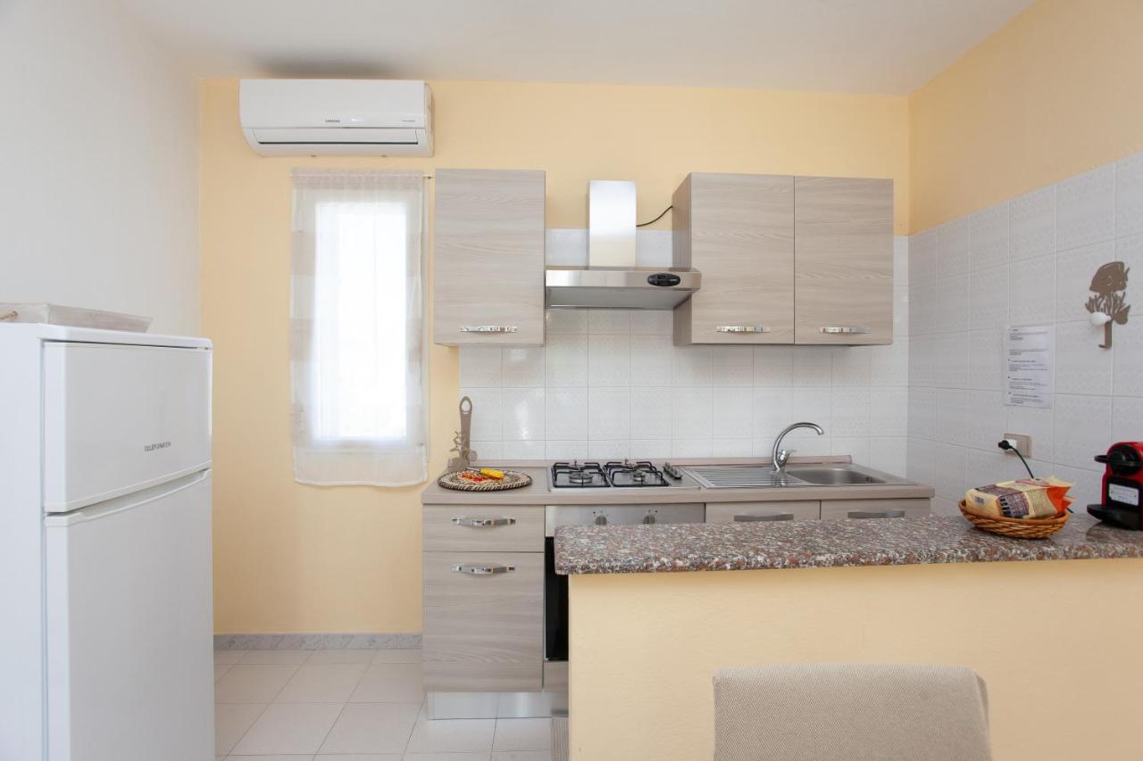 Appartamento Brezza Marina บูโดนี ภายนอก รูปภาพ