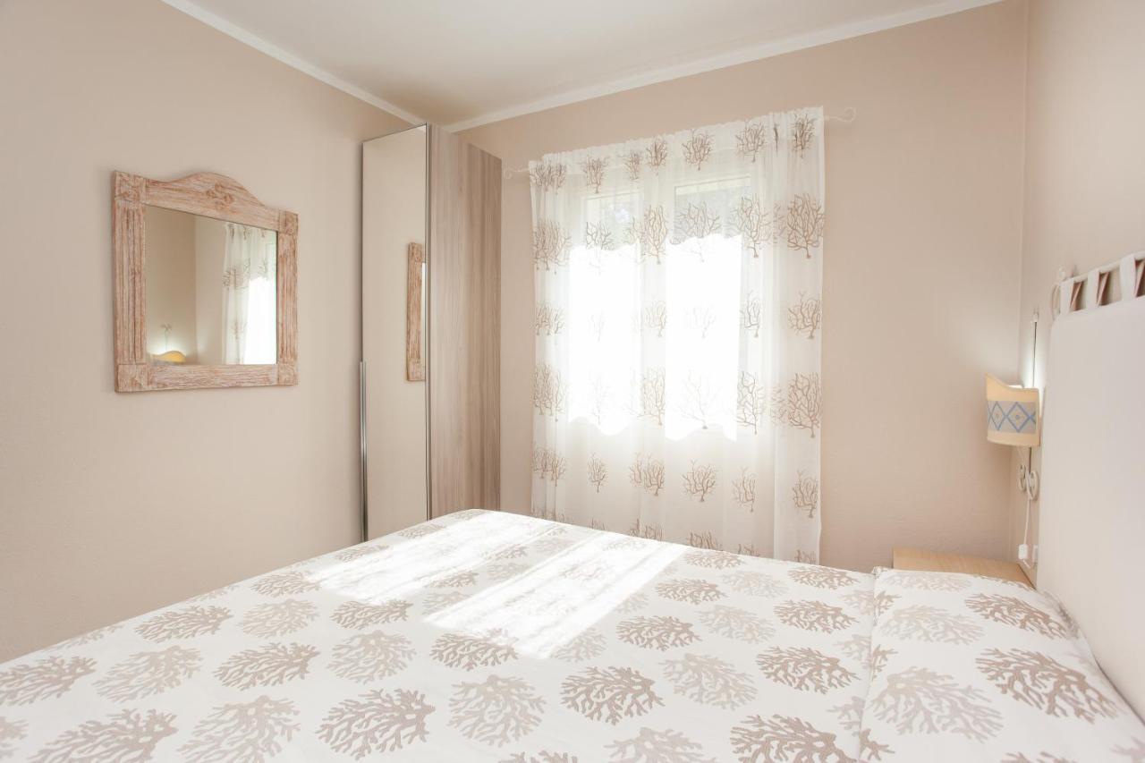 Appartamento Brezza Marina บูโดนี ภายนอก รูปภาพ